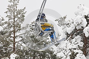 Ski lift and slope on a snow landscape. Winter sport