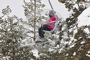 Ski lift and slope on a snow landscape. Winter sport