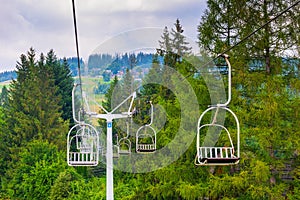 Ski lifts climb the hill