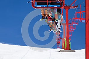 Ski lifts with people in a romanian ski resort
