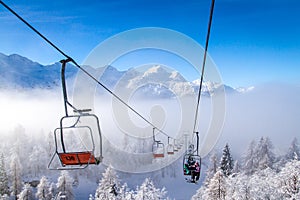Ski lifts at Vogel mountains in winter, Slovenia.