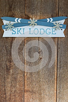 Ski lodge sign on rustic wood