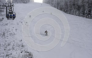 Ski man on slope Skier in high mountains