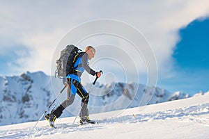 Ski mountaineering in action with seal skins photo