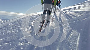 Ski mountaineers go up on an uphill track