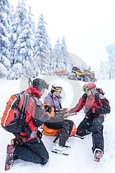 Ski patrol team rescue woman broken arm