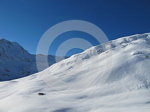 Ski piste with mountain hut