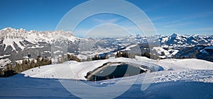 Ski piste Skiwelt Ellmau, view to Wilder Kaiser mountains and alpine range in winter