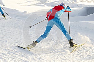 Ski race. Falling skier.