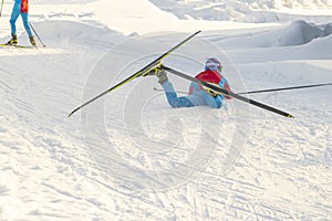 Ski race. Falling skier.