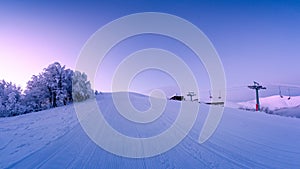 Ski resort, beautiful morning landscape. Ski trail trees and sky