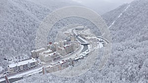 Ski resort infrastructure mountain river, hotels, bridges at winter season