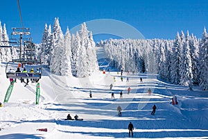 Ski resort Kopaonik, Serbia, lift, slope, people skiing