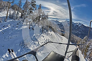 Ski resort in the mountains, ski lift ascend