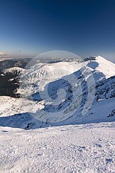 Ski resort in Slovakia. High mountain Tatras. Peak Chopok on sunny day.