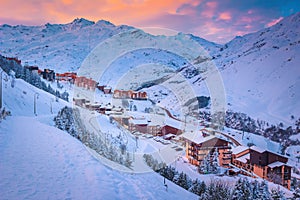 Ski resort in the valley at sunrise, Les Menuires, France