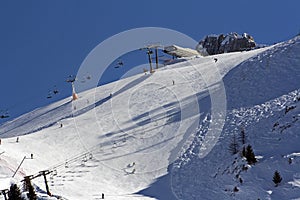 Ski slope in Alpine mountains
