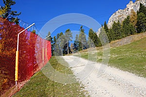 Ski slope in autumn at Seceda, Dolomites
