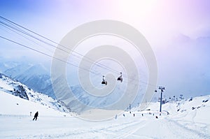 Ski slope and cable car on the ski resort
