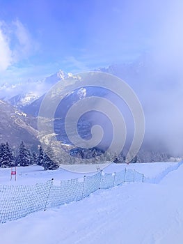 Ski slope and Chamonix town winter view, France