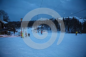 Ski slope in evening lights