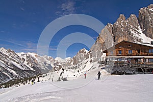 Ski slope and hut in Dolomites, Italy