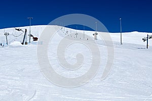 Ski slope in Khibiny against the blue sky