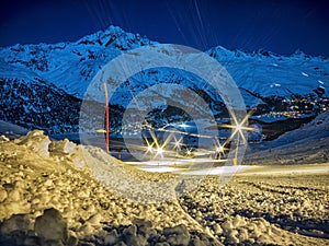 Ski slope in the night in Corvatsch photo