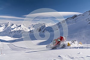 Ski slope preparation in the mountains