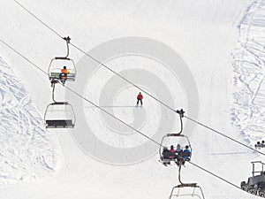 Ski slope at sestriere Italy with skiers and chair lift