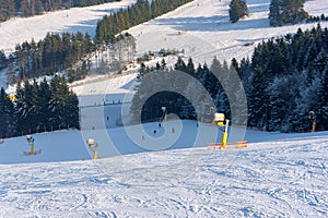 Ski slope at Slotwiny Arena ski station on a sunny day