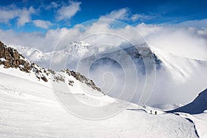 Ski slope in a winter mountain resort