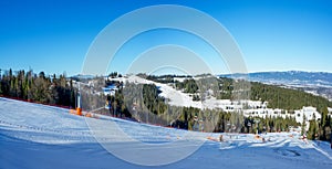 Ski slopes and chairlifts in Bialka ski resort in Poland