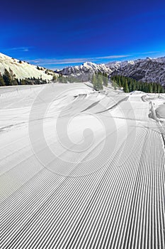 Ski slopes with the corduroy pattern on the top of Fellhorn Ski