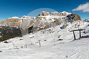 Ski slopes and lifts at ski resort in Italian Dolomites