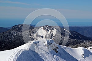 Ski slopes in snowy mountain resort Rosa Khutor, Sochi