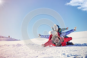 Ski, snow sun and fun - happy family on ski holiday