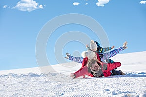 Ski, snow sun and fun - happy family on ski holiday