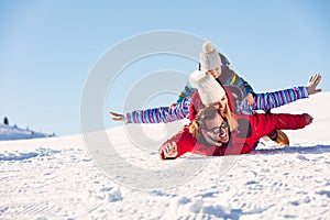 Ski, snow sun and fun - happy family on ski holiday