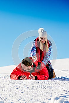 Ski, snow sun and fun - happy family on ski holiday