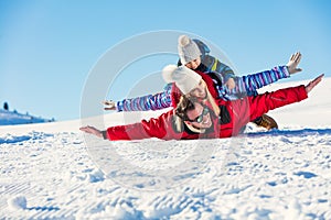 Ski, snow sun and fun - happy family on ski holiday