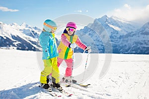 Ski and snow winter fun for kids. Children skiing