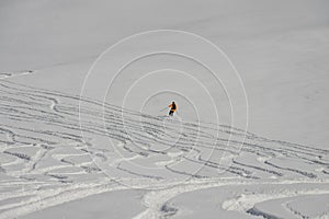 Ski, Snowboard freeride i deep powder snow. Gudauri Georgia Caucasus resort. Freeride in Caucasus mountains. Freeride snowboarding