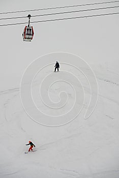 Ski, Snowboard freeride i deep powder snow. Gudauri Georgia Caucasus resort. Freeride in Caucasus mountains. Freeride snowboarding