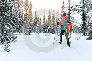 Ski touring in the deep fresh snow, Yllas, Lapland, Finland