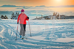 Ski touring on the hills at sunset, Transylvania, Romania, Europe