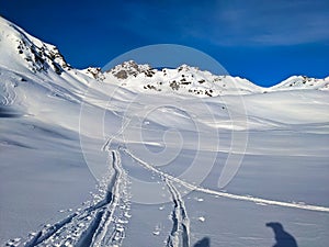 ski touring trail in the mountains. Alps in Europe,Switzerland.Ski mountaineering on the sentisch horn mountain in davos