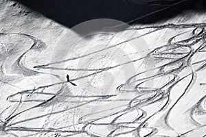 Ski traces on the snow. Ski tour in the Transylvanian Alps, Fagaras Mountains.