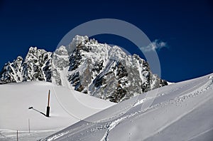 Ski tracks on the fresh snow at the off piste area at the Meribel Ski Resort in France.