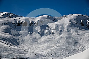 Ski tracks on the off piste terrain at the Meribel Ski Resort in France.